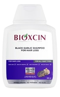 BIOXCIN, šampūnas nuo plaukų slinkimo su juoduoju česnaku, 300 ml.